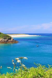 shell beach herm guernsey on sunny summer day