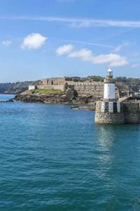 blue sky and sea with saint peter port in background