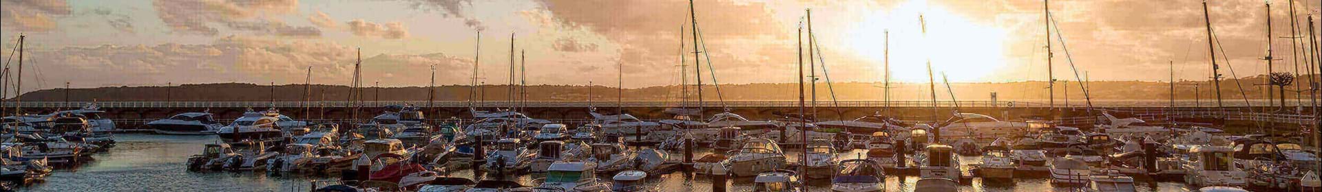 Sun setting over Jersey marina